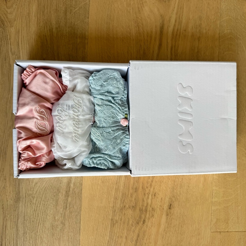 SKIMS Satin and Lace Bridal Thongs